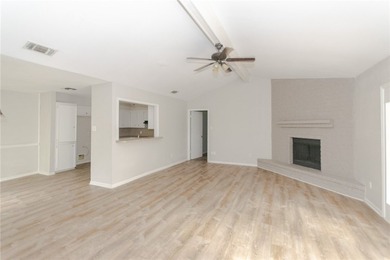 Step inside this solid 3 bedroom, 2 bathroom brick home offering - photo 2