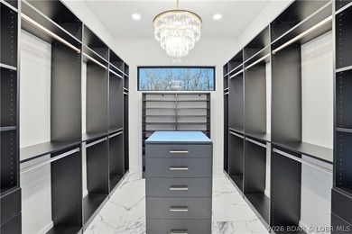 Welcome to your new modern retreat in Porto Cima. This stunning - photo 15