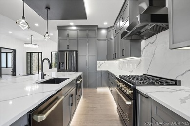 Welcome to your new modern retreat in Porto Cima. This stunning - photo 22