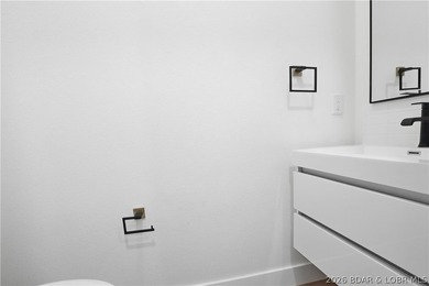 Welcome to your new modern retreat in Porto Cima. This stunning - photo 30