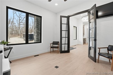 Welcome to your new modern retreat in Porto Cima. This stunning - photo 31