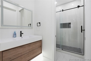 Welcome to your new modern retreat in Porto Cima. This stunning - photo 39