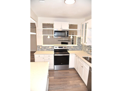 Welcome to this newly renovated coastal retreat which blends - photo 25