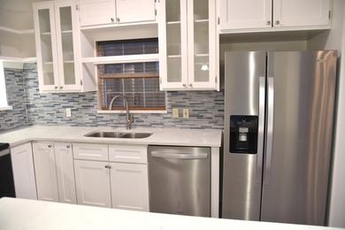 Welcome to this newly renovated coastal retreat which blends - photo 28