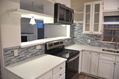 Welcome to this newly renovated coastal retreat which blends - photo 30