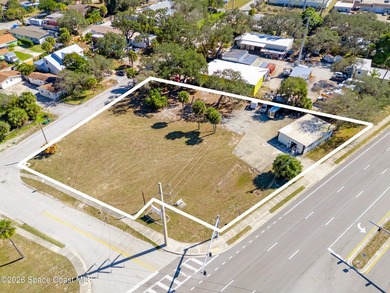 Prime 0.81-acre commercial corner located at a signalized - photo 1