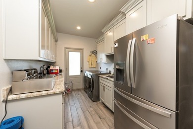 DISCOVER CASUAL, ELEGANT LAKE LIVING WITH THIS BEAUTIFULLY - photo 29