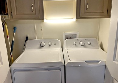 This home features New Dishwasher, Flooring, Newer Roof, A/C - photo 10