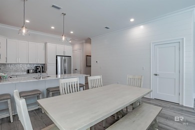 Coastal charm meets modern comfort in this stunning poolside - photo 12