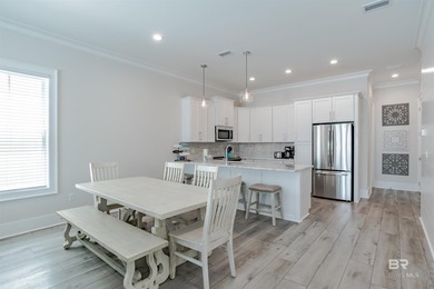 Coastal charm meets modern comfort in this stunning poolside - photo 13