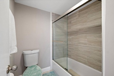 Completely renovated, light-filled second-floor condo offering - photo 17