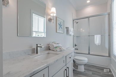 Coastal charm meets modern comfort in this stunning poolside - photo 22