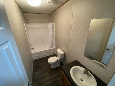 Experience the ease of living at Tall Pines, a 55+ Age Qualified - photo 12