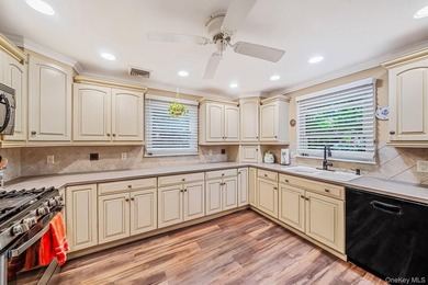 Nestled on a beautifully landscaped property surrounded by - photo 12