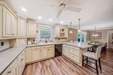 Nestled on a beautifully landscaped property surrounded by - photo 14