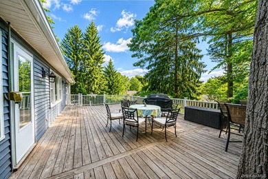 Nestled on a beautifully landscaped property surrounded by - photo 27