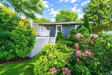 Nestled on a beautifully landscaped property surrounded by - photo 34