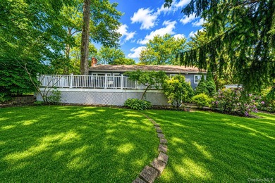Nestled on a beautifully landscaped property surrounded by - photo 35