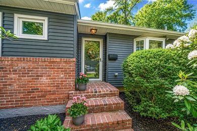 Nestled on a beautifully landscaped property surrounded by - photo 38