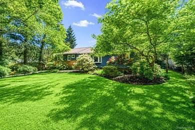 Nestled on a beautifully landscaped property surrounded by - photo 39