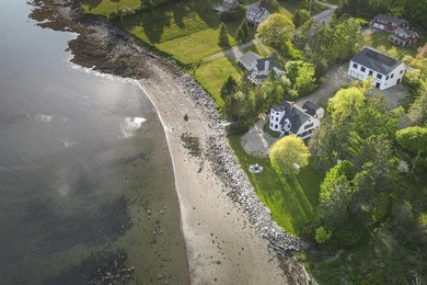 TWO HOMES-ONE OCEANFRONT PROPERTY: Set along the shores of - photo 1
