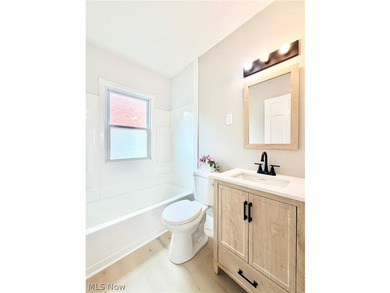 Welcome home to this fully remodeled, move-in-ready Cape Cod - photo 12