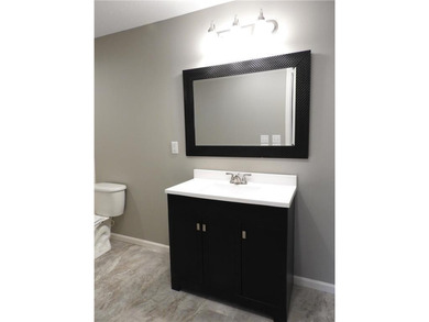 Detached townhome with pond views and a versatile 4-bedroom - photo 14