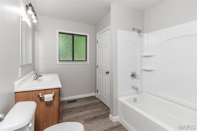 Affordable, move-in ready, and completely updated! This charming - photo 22