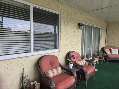 SPACIOUS 2/2 VILLA LOCATED ON QUIET STREET W/ SATELLITE POOL