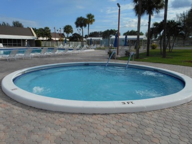 SPACIOUS 2/2 VILLA LOCATED ON QUIET STREET W/ SATELLITE POOL