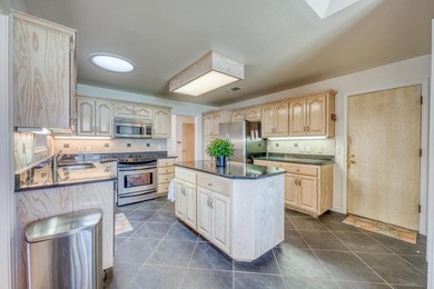 This charming waterfront retreat is perfectly positioned on a