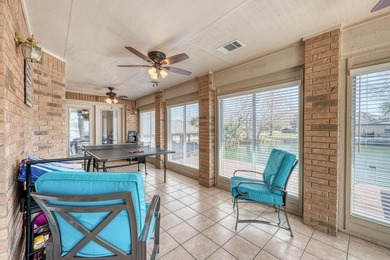 This charming waterfront retreat is perfectly positioned on a