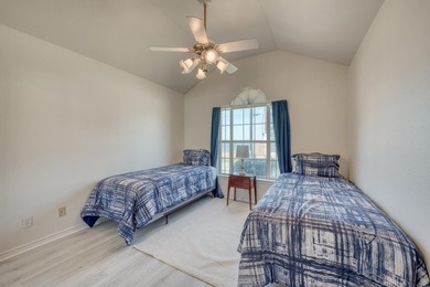 This charming waterfront retreat is perfectly positioned on a