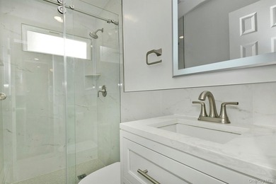 Welcome to 34 Warner Road, Huntington NY. This totally renovated - photo 15