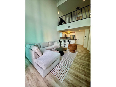 Wake up to water views and natural light pouring through 20-foot