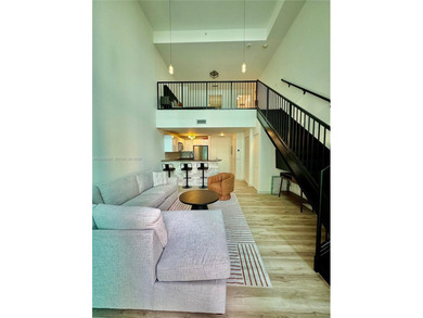 Wake up to water views and natural light pouring through 20-foot