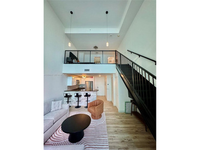 Wake up to water views and natural light pouring through 20-foot