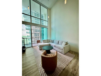 Wake up to water views and natural light pouring through 20-foot