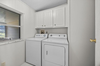 New roof, Upgraded A/C, irrigation on a well. True 3 bedroom - photo 25