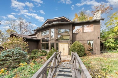 Distinctive Mid-Century Modern retreat offering nearly 5,000