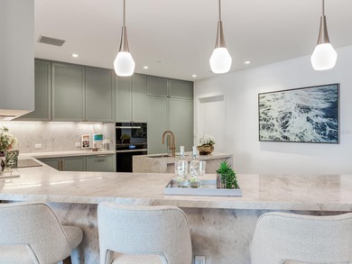 Awaken to a life of quiet elegance and breathtaking waterfront