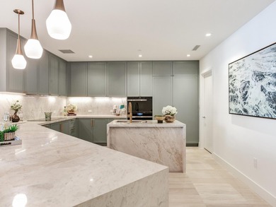 Awaken to a life of quiet elegance and breathtaking waterfront