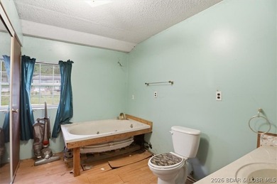 4 Beds | 2 Bath fixer upper in Stover, Mo! A fantastic chance to - photo 21