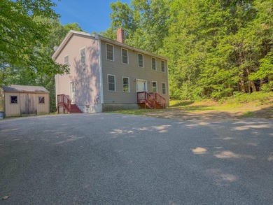 Welcome to this charming 4-bedroom, 2-bath Colonial nestled in a - photo 2