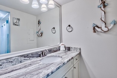 Jetty East is a Gulf front Gated 6-story midrise with under - photo 14
