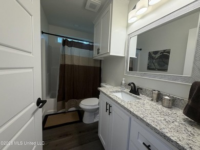 Completely remodeled inside and out, this waterfront coastal - photo 15