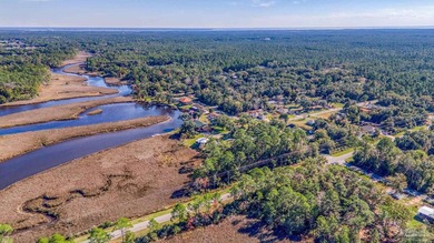 Nestled on nearly half an acre of serene waterfront property - photo 22
