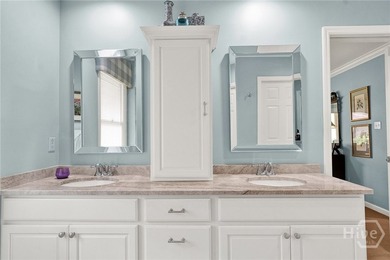 This exceptionally updated, one-level end unit on the lagoon is - photo 25
