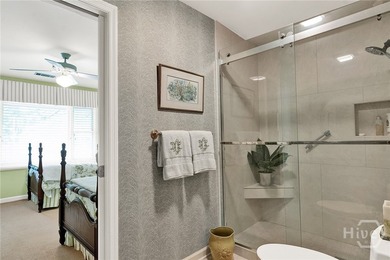 This exceptionally updated, one-level end unit on the lagoon is - photo 29