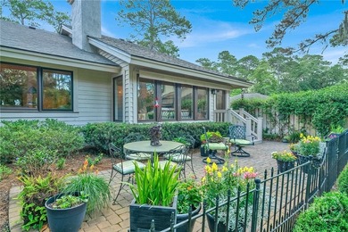 This exceptionally updated, one-level end unit on the lagoon is - photo 31